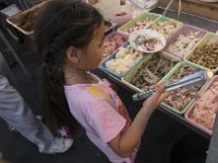 Une jeune cliente très méticuleuse